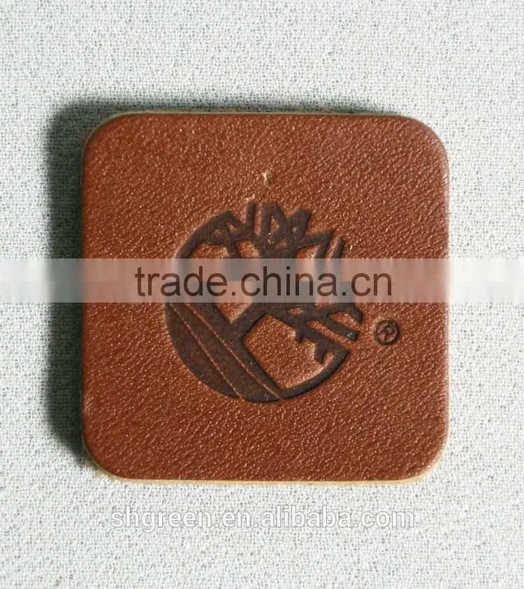 Green laser cut hot press embossed logo leather patch