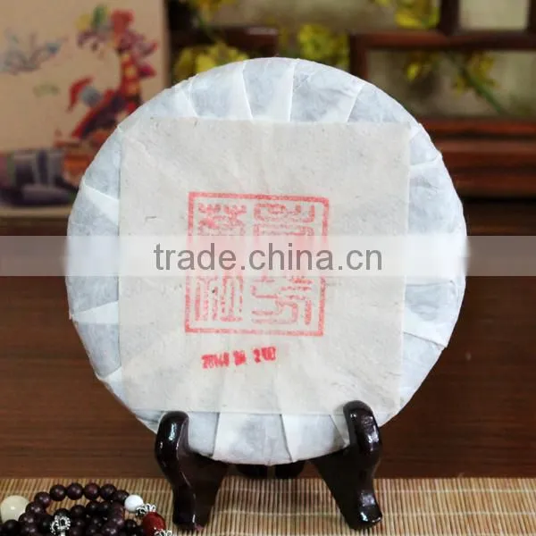 2014 Spring YiWu Tea Mountain Ancient Arber Raw Puer Tea Drinks Lower Blood Pressure