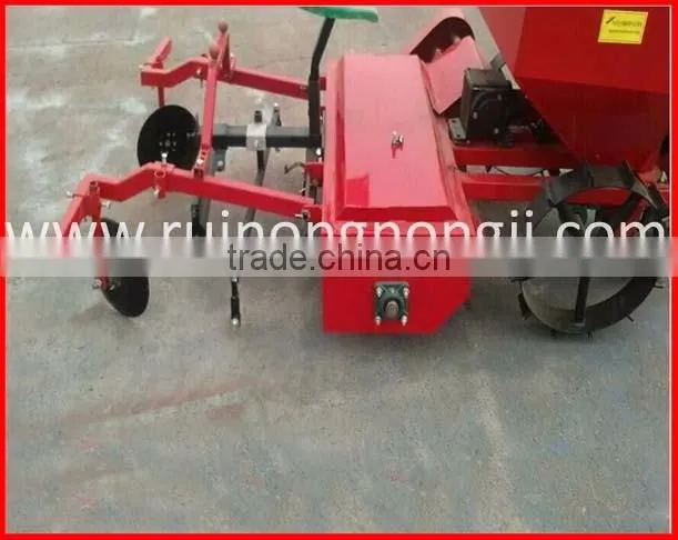 Three point mounted walking tractor matched cups potato planter