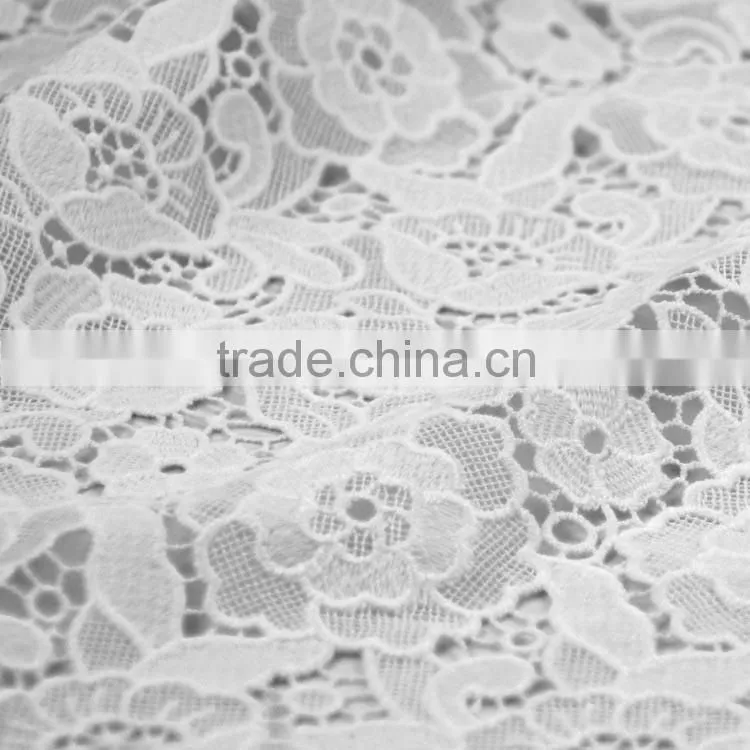 Fashion promotional custom new wedding net dress materials embroidery designs fabric by the yard