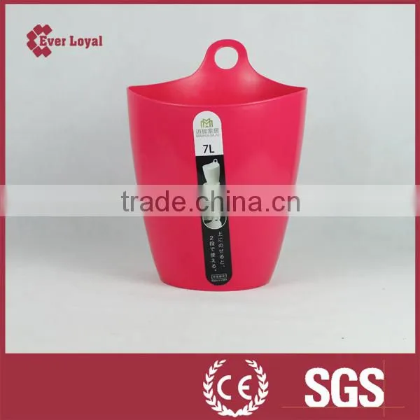 Bin stacks up to receive the bucket, plastic stacking box