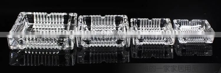 clear glass ashtray with different size square and round shape