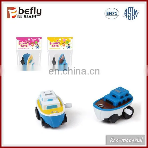 Novelty toy plastic wind-up chick in capsule