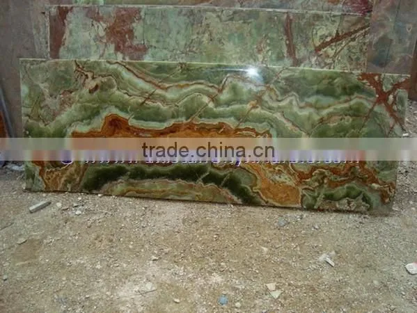 A GRADE DARK GREEN ONYX TABLE TOPS COLLECTION