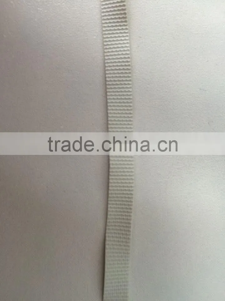 Textured natural rubber elastic tape for swimwear