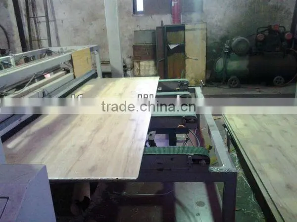 Hand grasps laminated floor