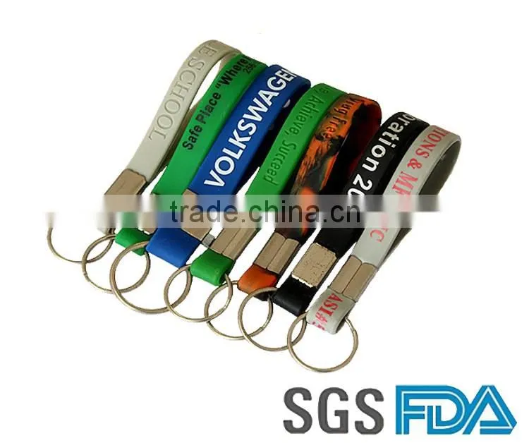 China Manufacturer Cheap custom LOGO silicone wristband keychain