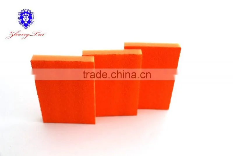 orange sourcing pad with yellow sponge for kitchen supplies