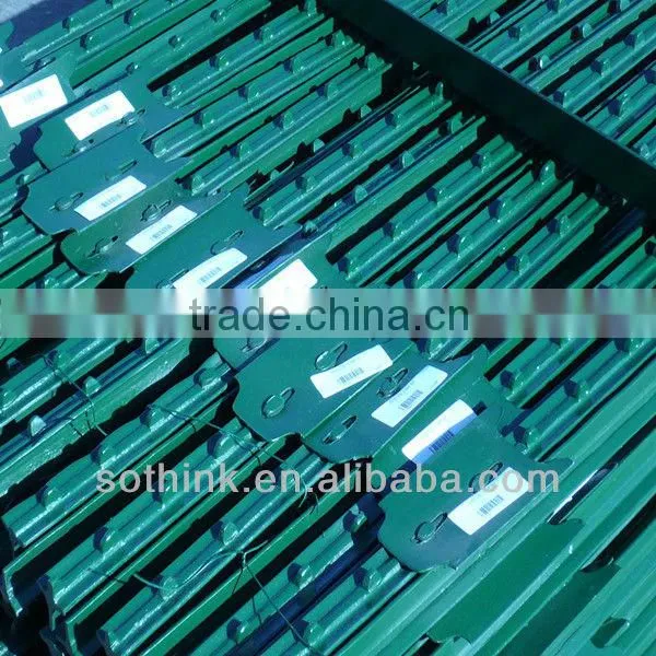 green painted farm fencing used t bar fence post