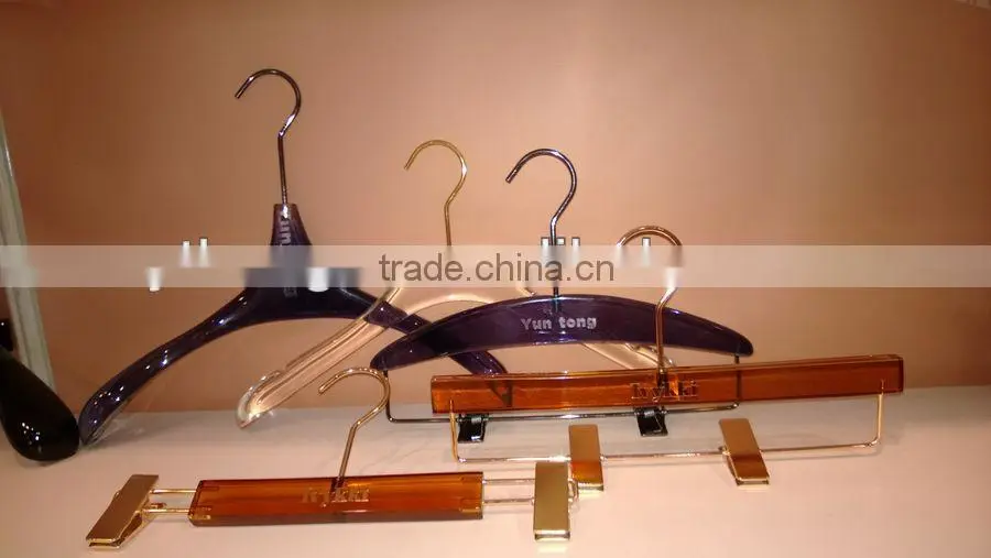 Gold wire coat hangers for luxury garment brand store use