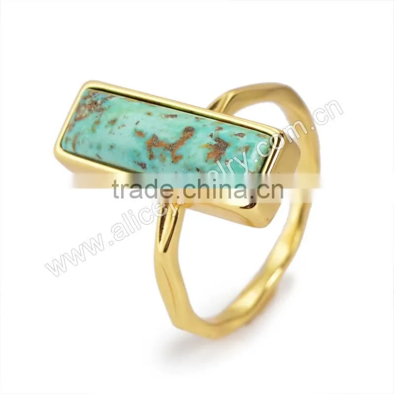 Natural blue turquoise set into a 18k gold bezel