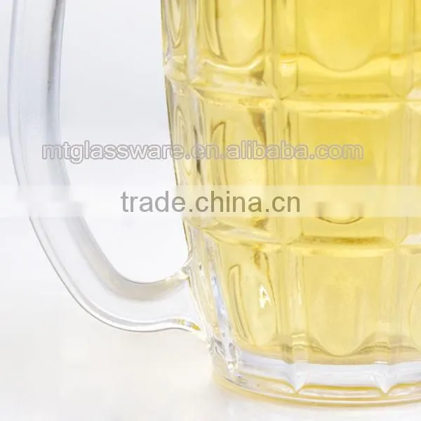 Machine made clear glass beer mug with handle