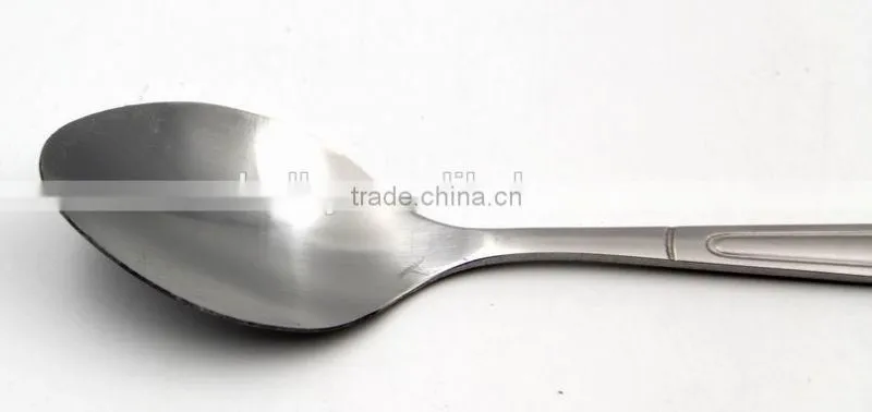 Modern stainless steel cocktail spoon in the bar