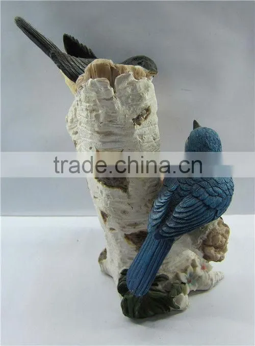 Polyresin antique bird figurine