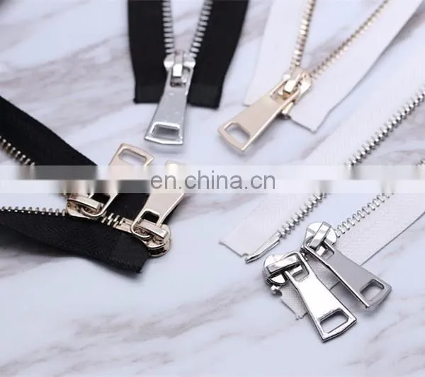 black and white double -ended light gold and white gold silver metal zipper