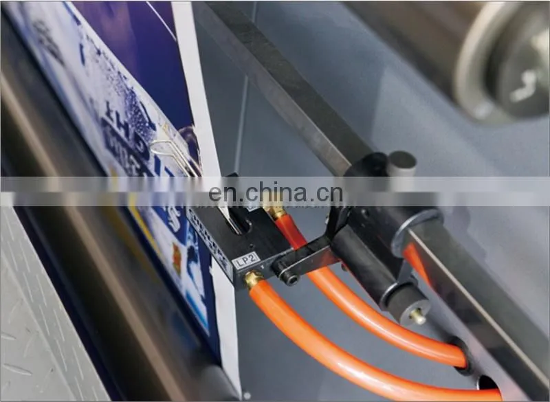 UCM1900A High Speed 4 Roll Automatic Paper cutting slitting Machine with conveyor belt stacker