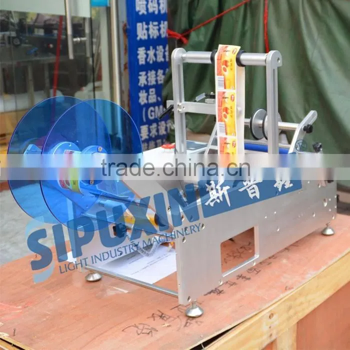 Sipuxin semi automatic round bottle labeling machine