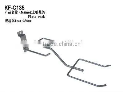 Wooden pants hanger with metal clamp