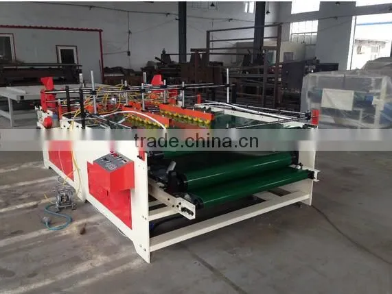 Corrugated paperboard folding gluing machine