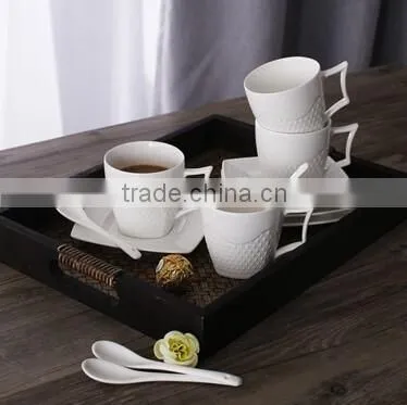 white porcelain coffee set