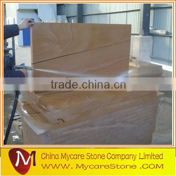 Polished sandstone paving