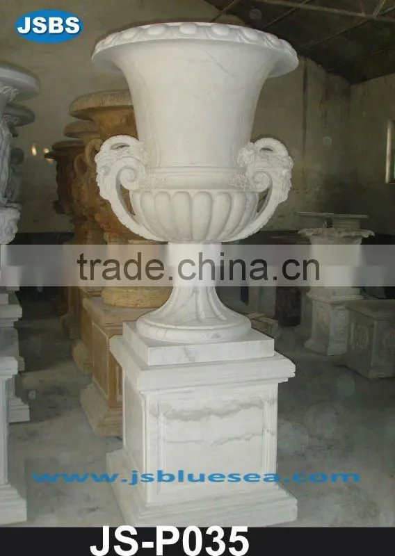 Golden marble planter with man head