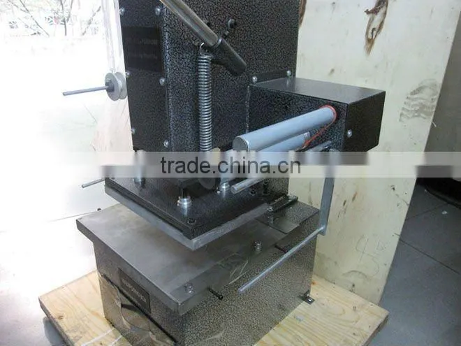 Manual date stamping machine