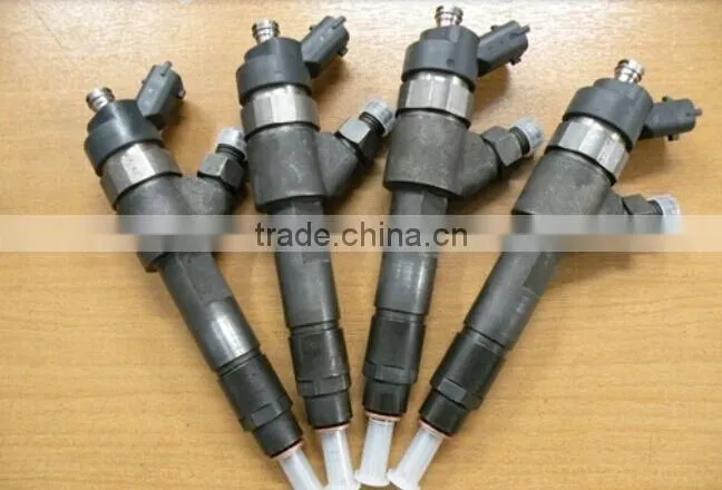 Low price Orginal and genuine BOSCH Common rail injector 0445120002 for IVECO 500313105 500384284 FROM BEACON MACHINE