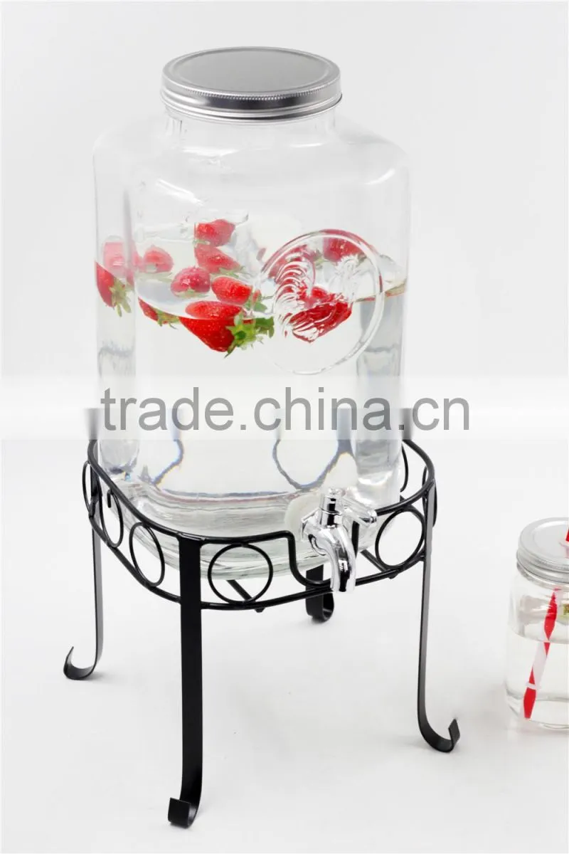 beautiful glass drinking dispenser with iron base set