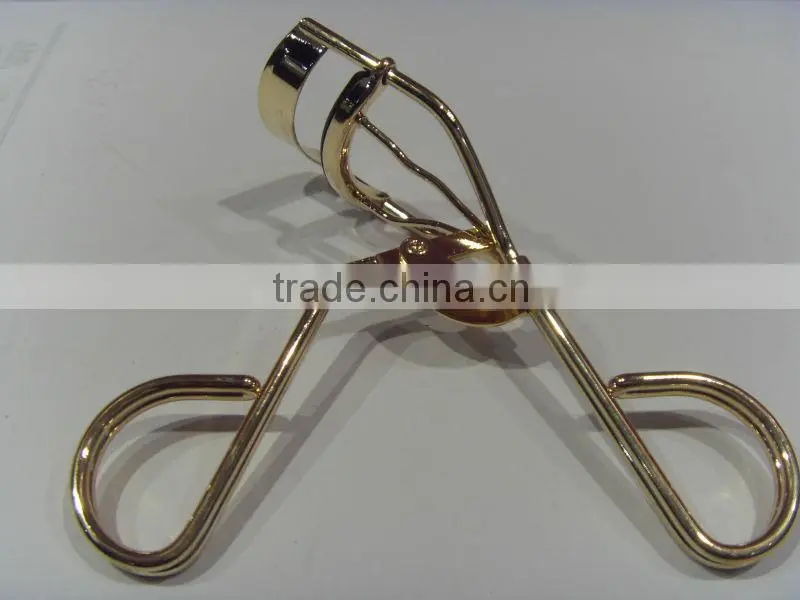 Silver colour tweezers and stainless steel eyelash curler