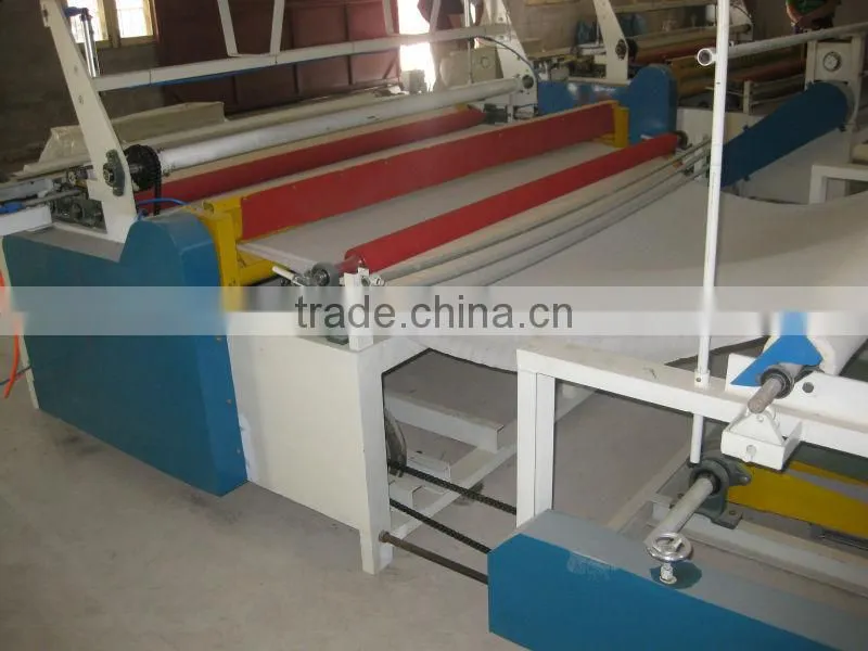 Tolet paper rewinder machine,rewinding with embossing part