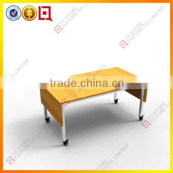 Wooden table top display for clothes