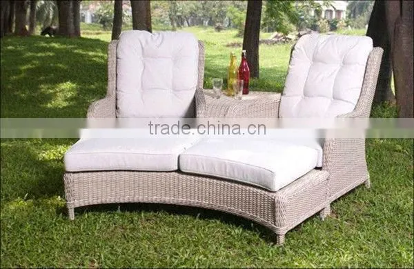 Rattan Loveseat and Footrest With Cushion