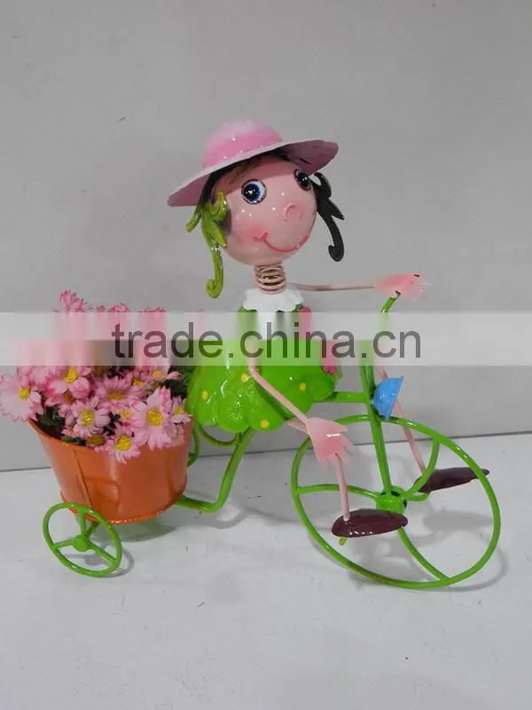 Functional little metal girl with bicycle