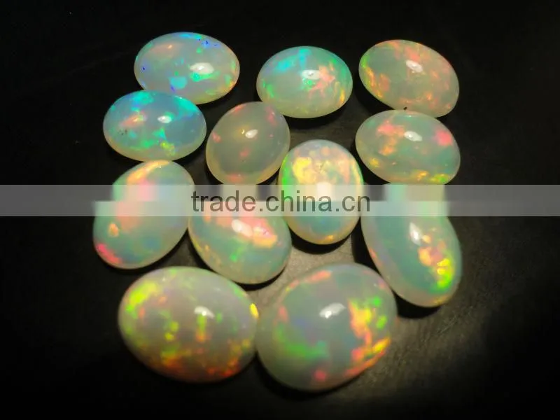 Natural Ethiopian Fire Opal oval cabochon cut beads