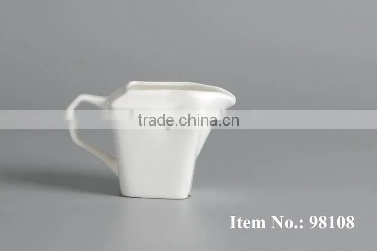 white ceramic drinkware milk creamer