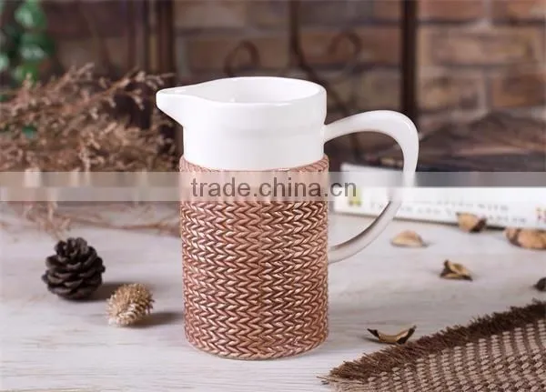 Embossed and Hand-painted Ceramic Water Jug