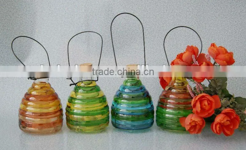 colored glass wasp bottle