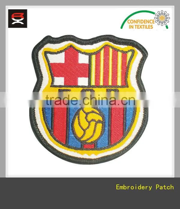 Adhesive pellon backing embroidered border woven patch