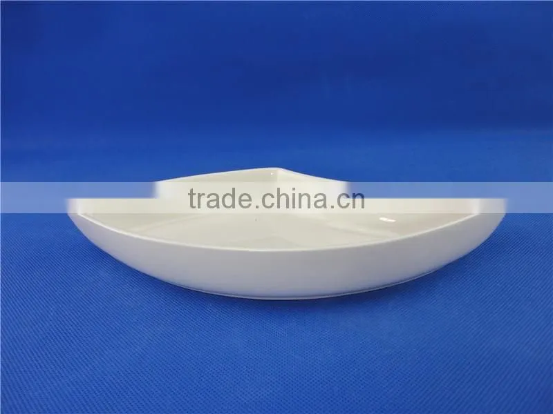 white porcelain peacock fruit dish