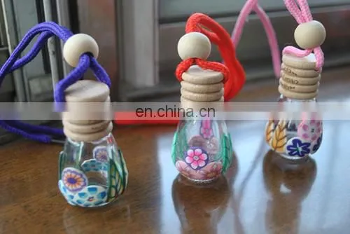 2014 hottest unique design polymer clay perfume glass bottle with cork