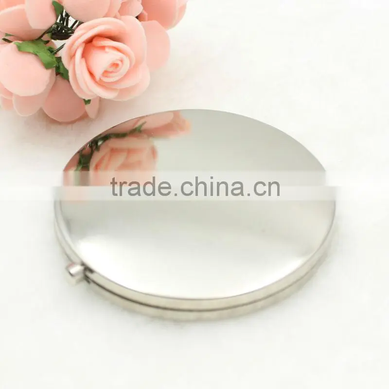 Religious metal round pocket mirror