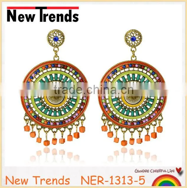 Fancy design gold earring with crystal and small plastic beads