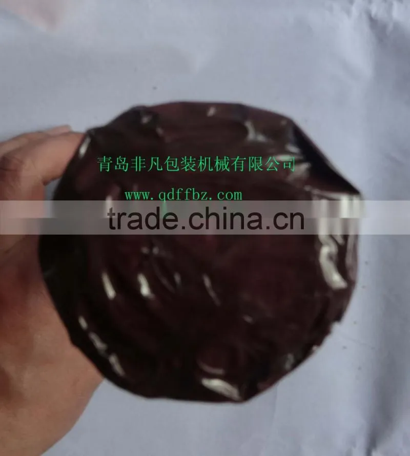 Envelope type biscuit overwrapping machine