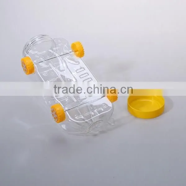 Small cute clear plastic bottles in toy shaped for candy