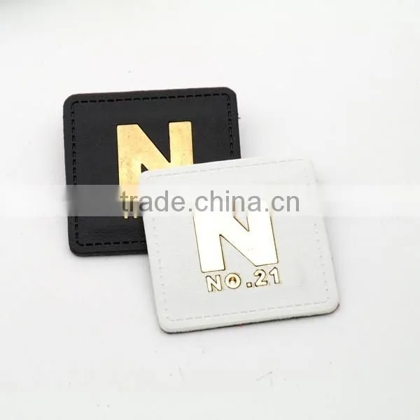 White/black PU leather sew on patches with Gold metal plates fashion clothing label for jeans/jacket PLB-022