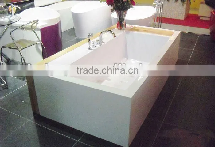 stone bathtub,wood cabinet,solid stone bathtub