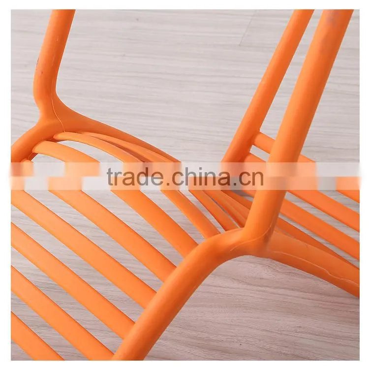Simple stackable red plastic chair