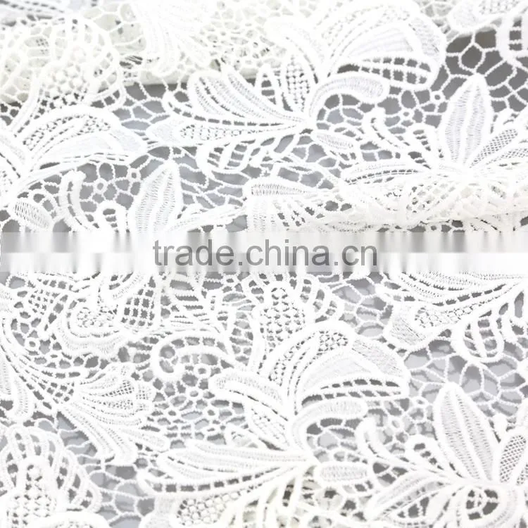 Guangzhou factory supply embroidered moisture and cool white cutwork embroidery fabric for dress