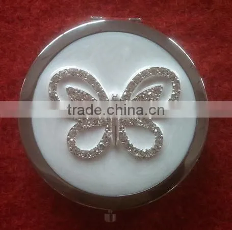 black handmade compact mirror with metal octopus decor